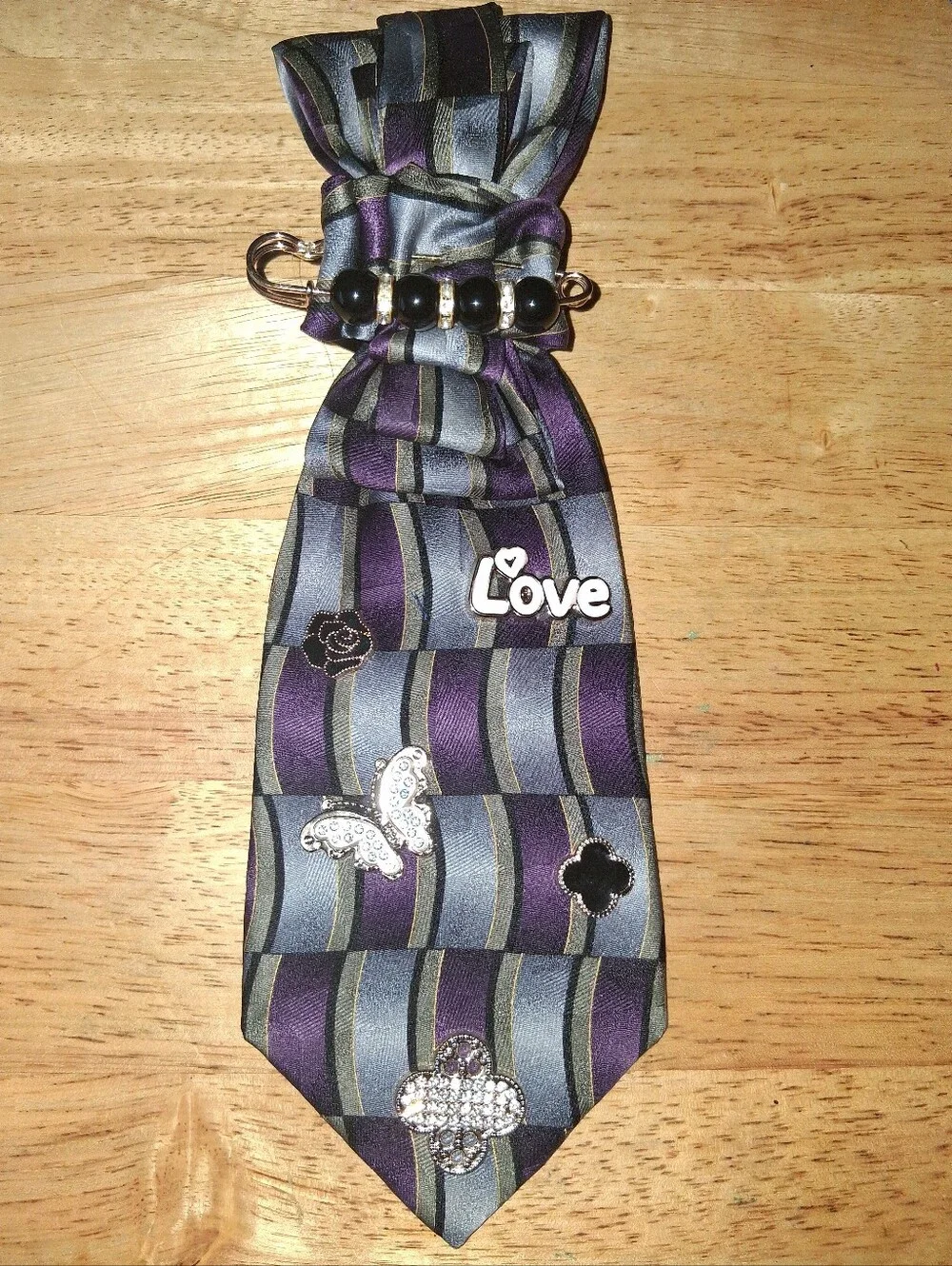 Crystal Lip Brooch on Gray Striped Bow Scarf